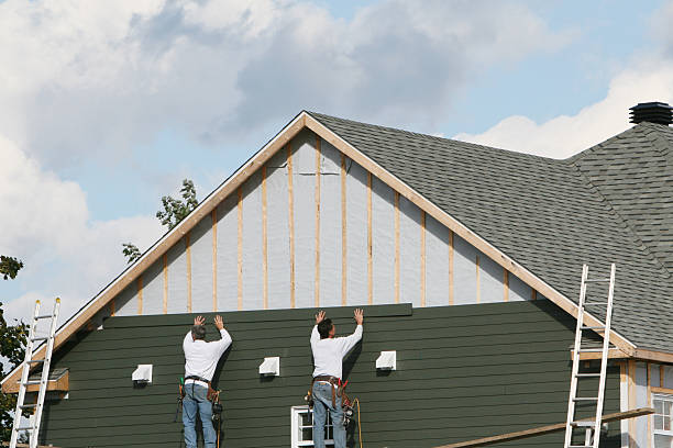 Professional Siding technician working in Franklinton, NC